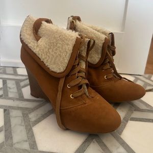 Tan heeled boots with shearling lining